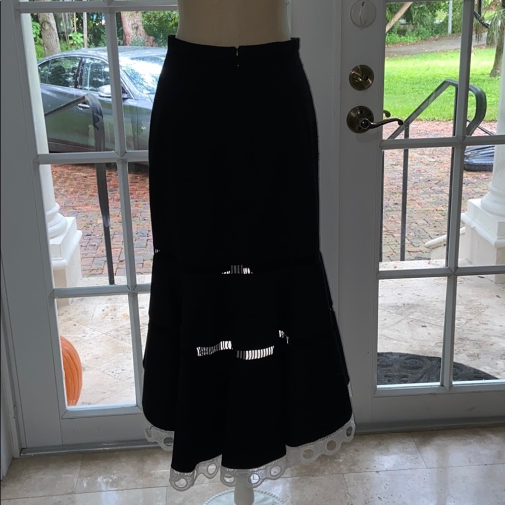 Dramatic and elegant black skirt with white lace